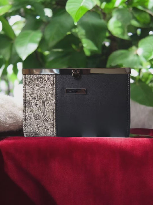 The Compact Clutch Wallet in black & white.