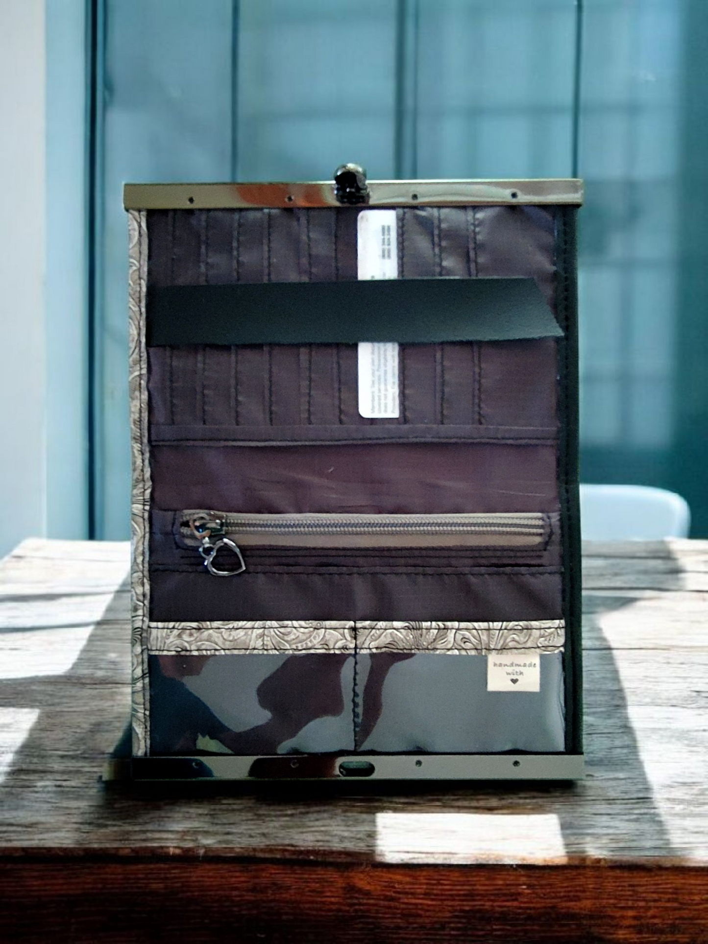 The Compact Clutch Wallet in black & white.